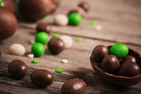 Chocolate Easter Eggs Over Wooden Backgroundの写真素材