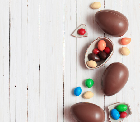 Chocolate Easter Eggs Over Wooden Backgroundの写真素材