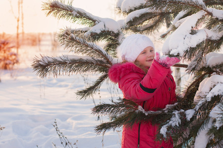 smile girl in winter parkの写真素材
