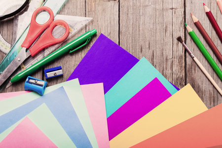 Back to school concept on wooden background