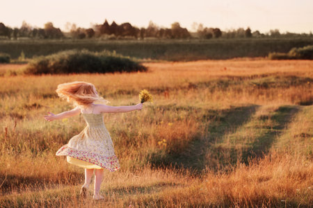 happy little girl outdoorの写真素材