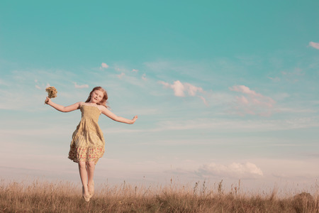 jumping girl outdoorの写真素材