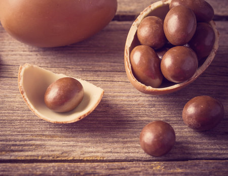 Chocolate Easter Eggs Over Wooden Background