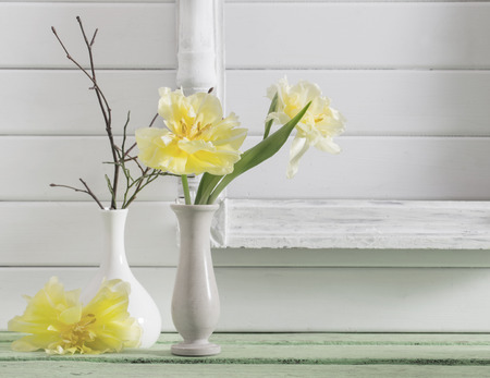 TYellow tulips on wooden backgroundの写真素材