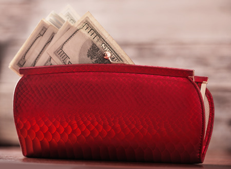 Red purse and moneyの写真素材