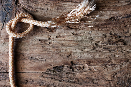 rope on a wooden backgroundの写真素材