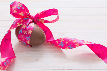 Chocolate Easter Eggs Over Wooden Backgroundの写真素材