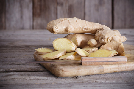 Ginger on wooden backgroundの写真素材