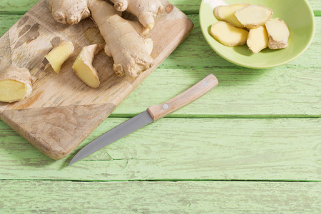 Ginger on wooden backgroundの写真素材