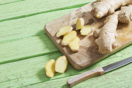 Ginger on wooden backgroundの写真素材