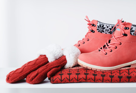 beautiful winter female clothes and shoes on white backgroundの写真素材
