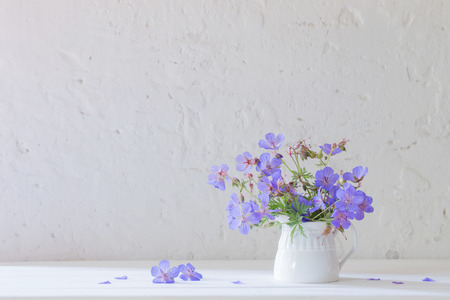 flowers in jug on white backgroundの写真素材
