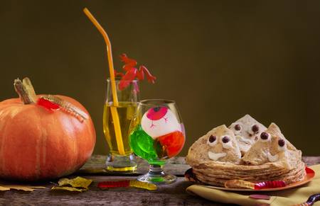 Pancakes  in the form of a ghost on dark backgroundの写真素材