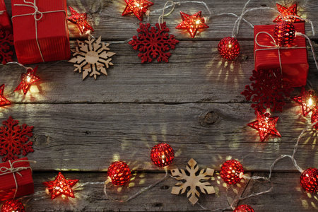 christmas lights on wooden background