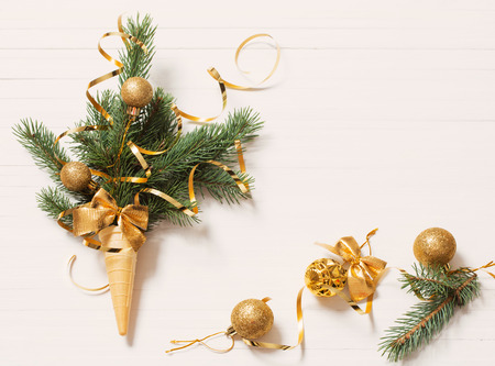 Christmas fir in waffle cone on white backgroundの写真素材