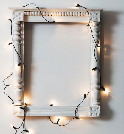 vintage wooden frame with light garlandの写真素材