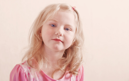 portrait of beautiful little blond girl の写真素材