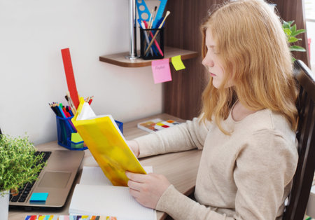 girl teenager doing homework
