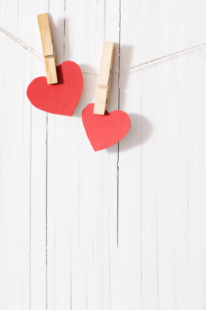 red paper heart on wooden backgroundの写真素材