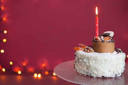 birthday cake with burning  candleの写真素材
