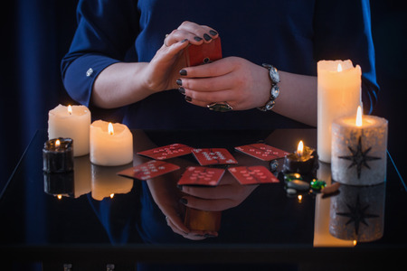 divination with cards and candlesの写真素材