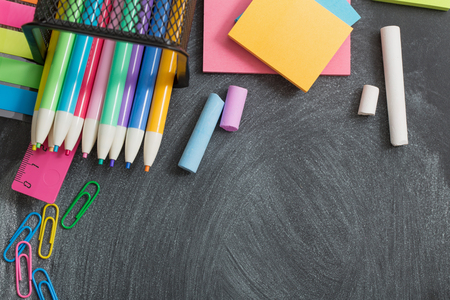 school supplies on  blackboardの写真素材