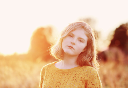 portrait teenager girl on sunsetの写真素材