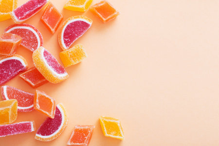 marmalade sweets on colored background