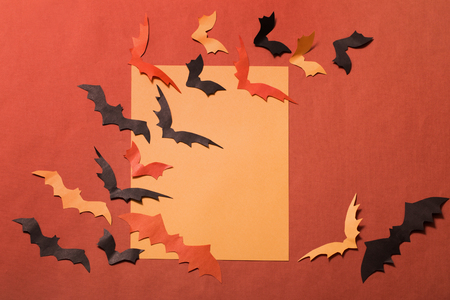 the paper bats on paper backgroundの写真素材