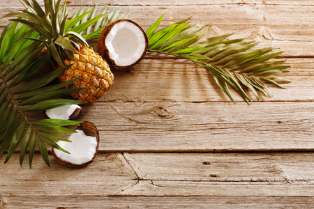 summer background with pineapple and coconutの写真素材