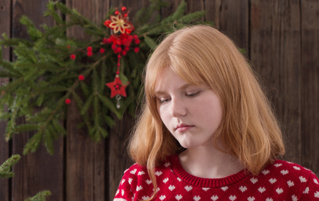 teenager girl with Christmas decorationsの写真素材