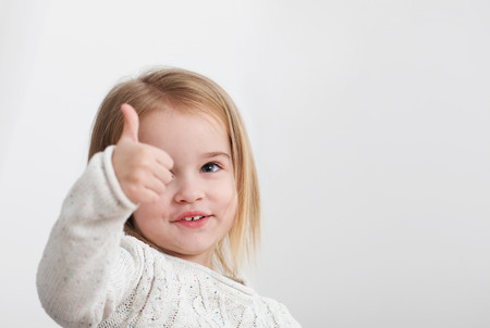 little beautiful girl on white backgroundの写真素材