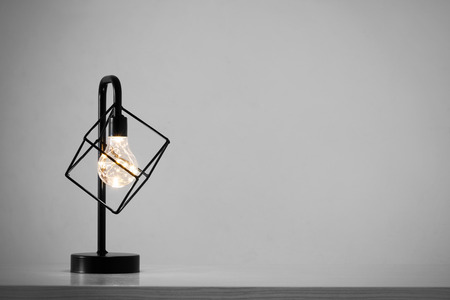 metal black lamp on grey backgroundの写真素材