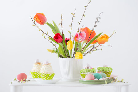 Easter arrangement with tulips and cupcakes