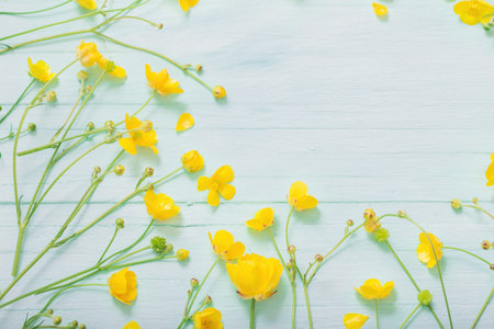 summer flowers on green wooden background