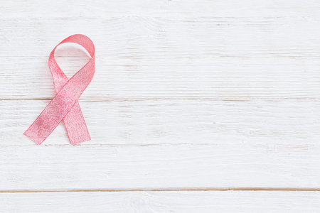pink ribbon as  symbol of fighting breast cancerの写真素材