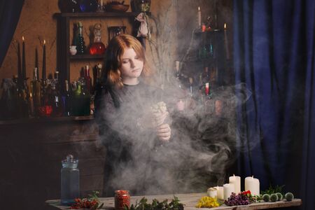 young witch in home. Halloween conceptの写真素材