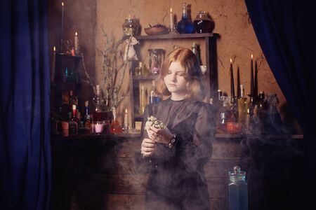 young witch in home. Halloween conceptの写真素材