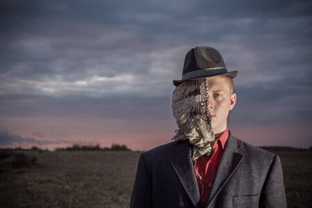 portrait of  young man turned into  scarecrowの写真素材