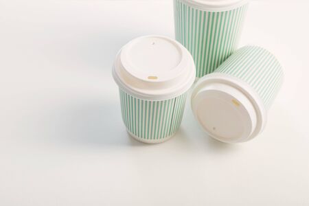 paper cup of coffee on white backgroundの写真素材