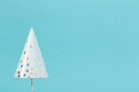 paper Christmas tree on blue backgroundの写真素材