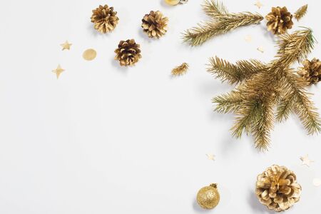 golden Christmas decorations on white backgroundの写真素材