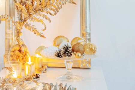 Christmas golden decor in white interiorの写真素材