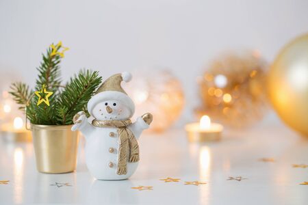 Christmas decorations with little ceramic snowmanの写真素材