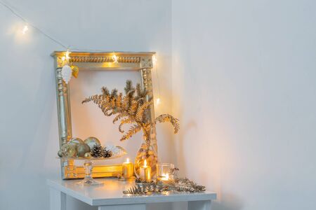 Christmas golden decor in white interiorの写真素材