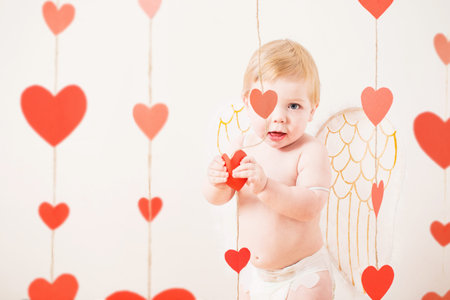 little baby with angel wings, valentine's day concept