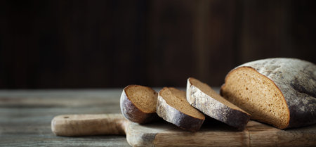 sliced bread on dark wooden table
