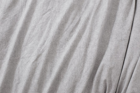 background from  gray linen bed sheet surface