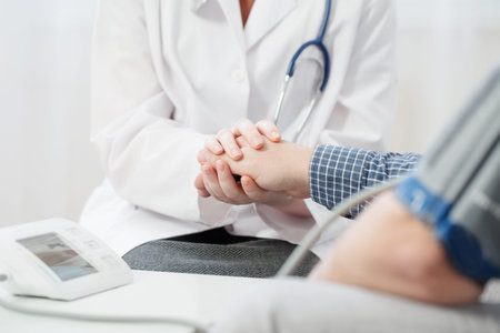 doctor measures the patientâ€™s pressure and holds his hand, healthcare, hospital and medicine...