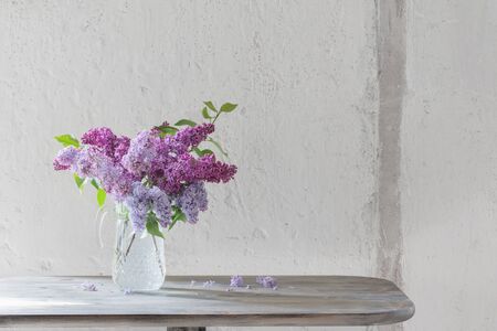 bouquet of lilacs in a glass jugの写真素材